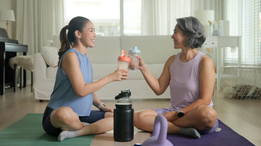 young adult child and active mature middle age old mum drink whey protein shakes